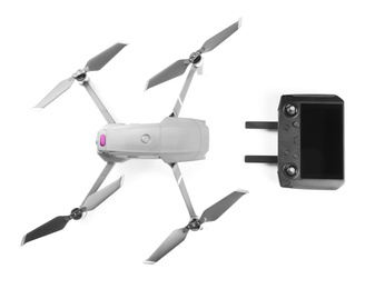 Photo of Modern drone with controller on white background, top view