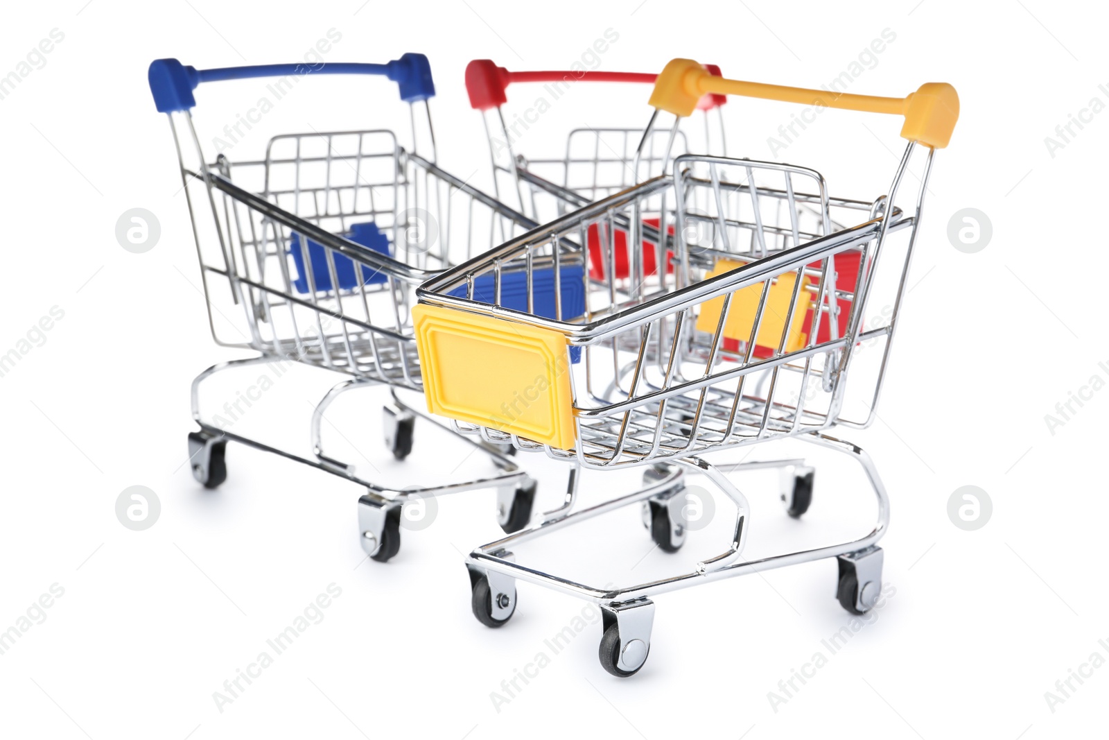 Photo of Empty metal shopping trolleys isolated on white