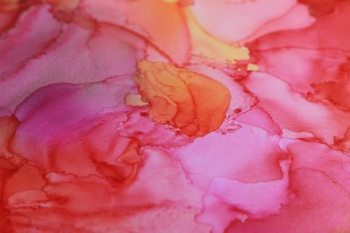 Abstract liquid ink art painting as background, closeup