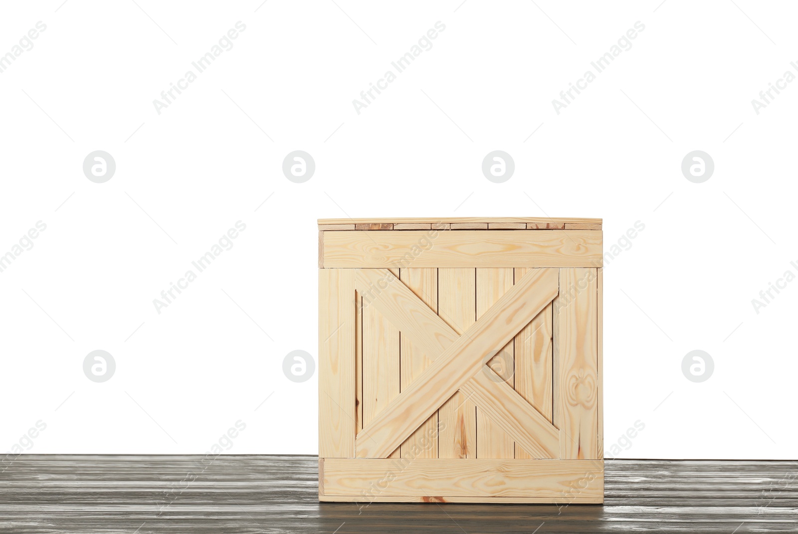 Photo of Wooden crate on table against white background. Space for text