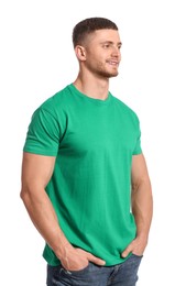 Man wearing green t-shirt on white background. Mockup for design