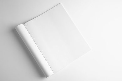 Photo of Blank book on white background, top view. Mock up for design