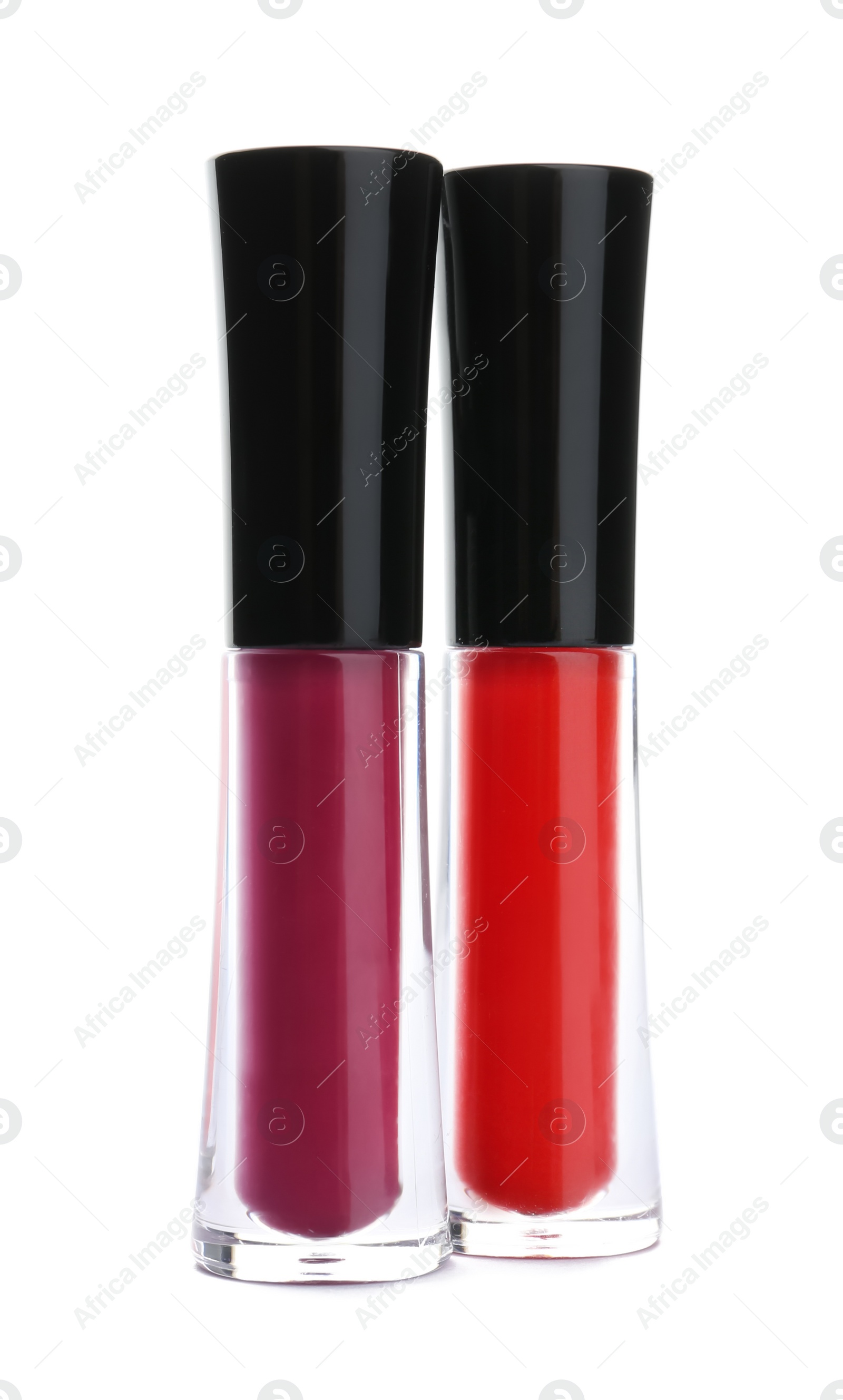 Photo of Lip glosses on white background