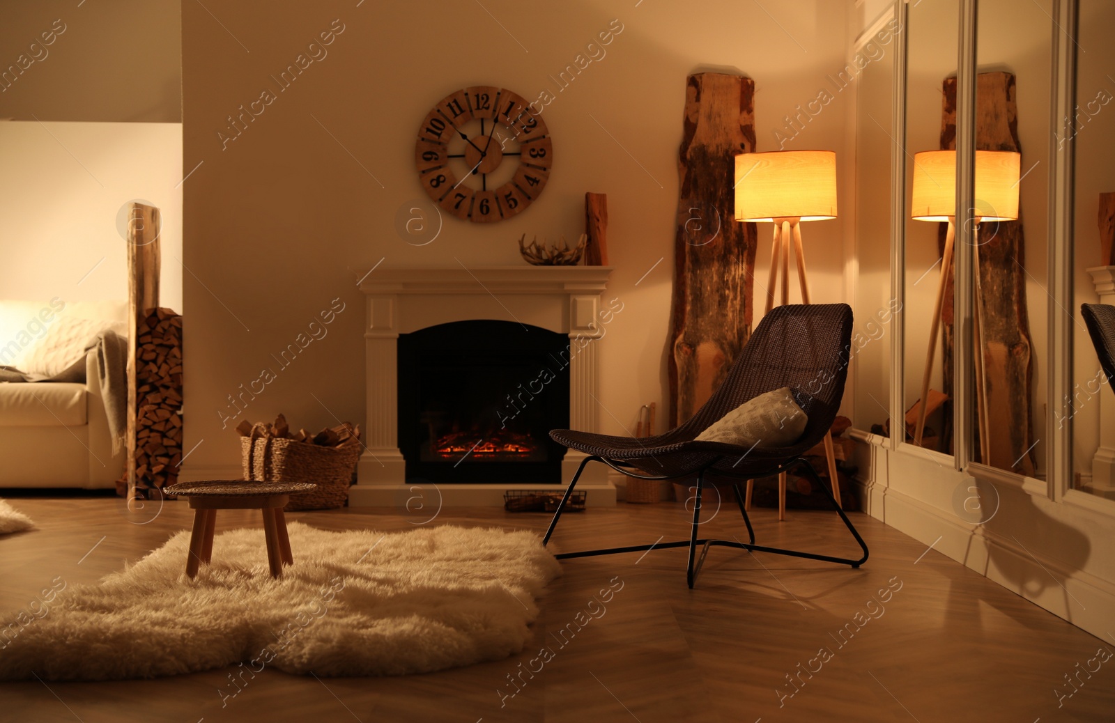 Photo of Beautiful view of cozy living room interior with modern fireplace