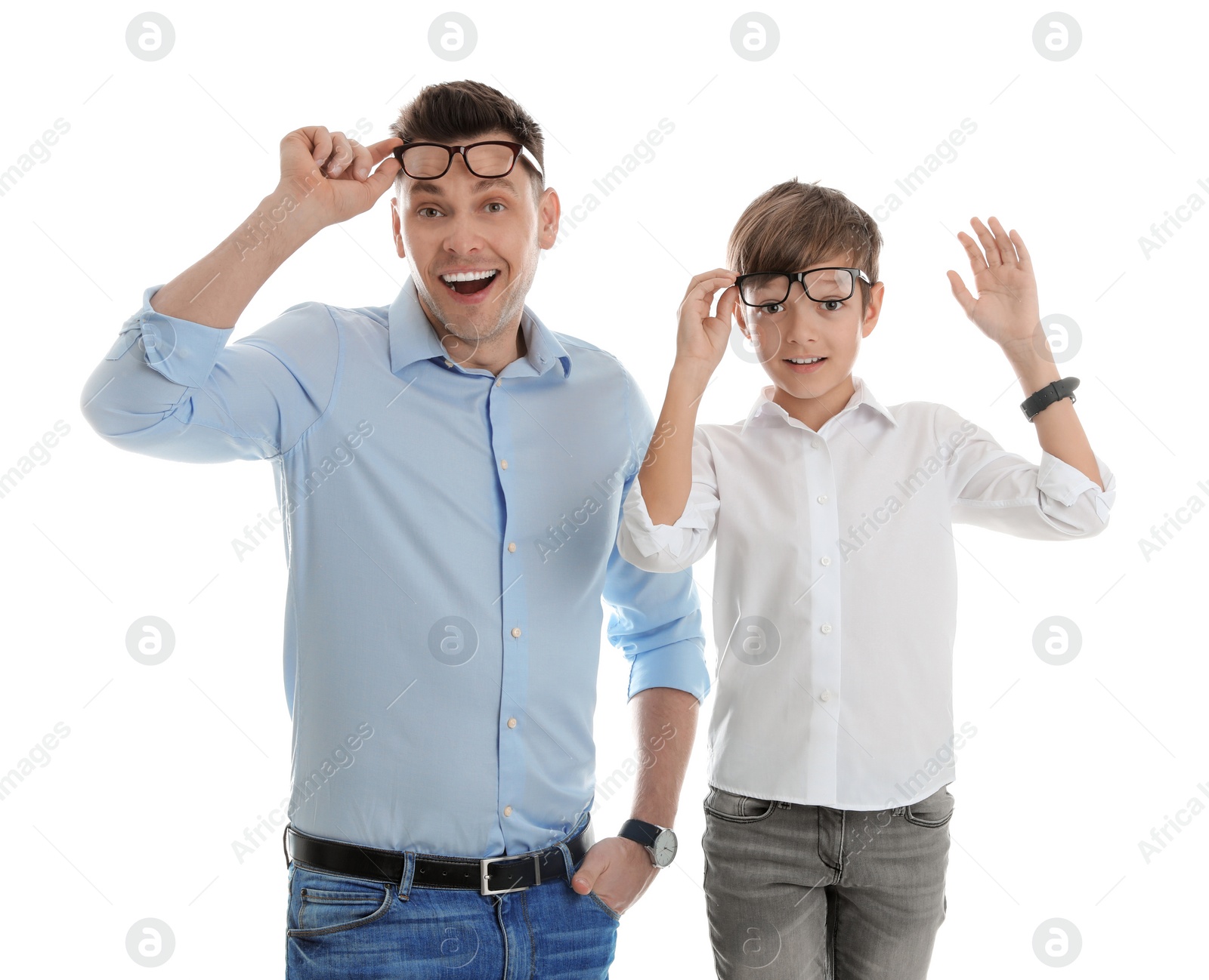 Photo of Portrait of emotional dad and his son isolated on white