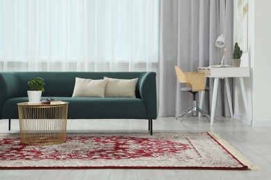 Photo of Stylish living room with beautiful carpet and furniture. Interior design