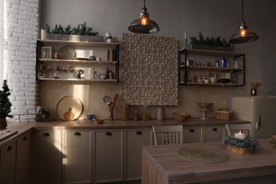 Photo of Kitchen interior with festive decor. Christmas celebration