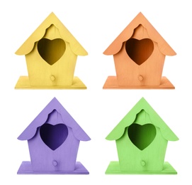 Set with different colorful bird houses on white background 