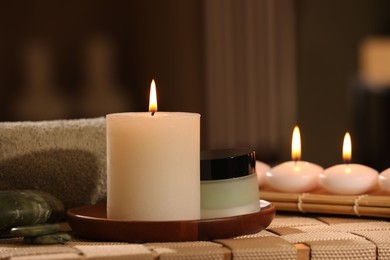 Photo of Beautiful composition with different spa products on wicker bench indoors