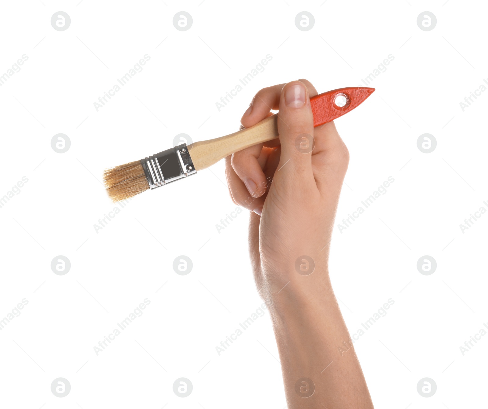 Photo of Woman holding paint brush on white background, closeup