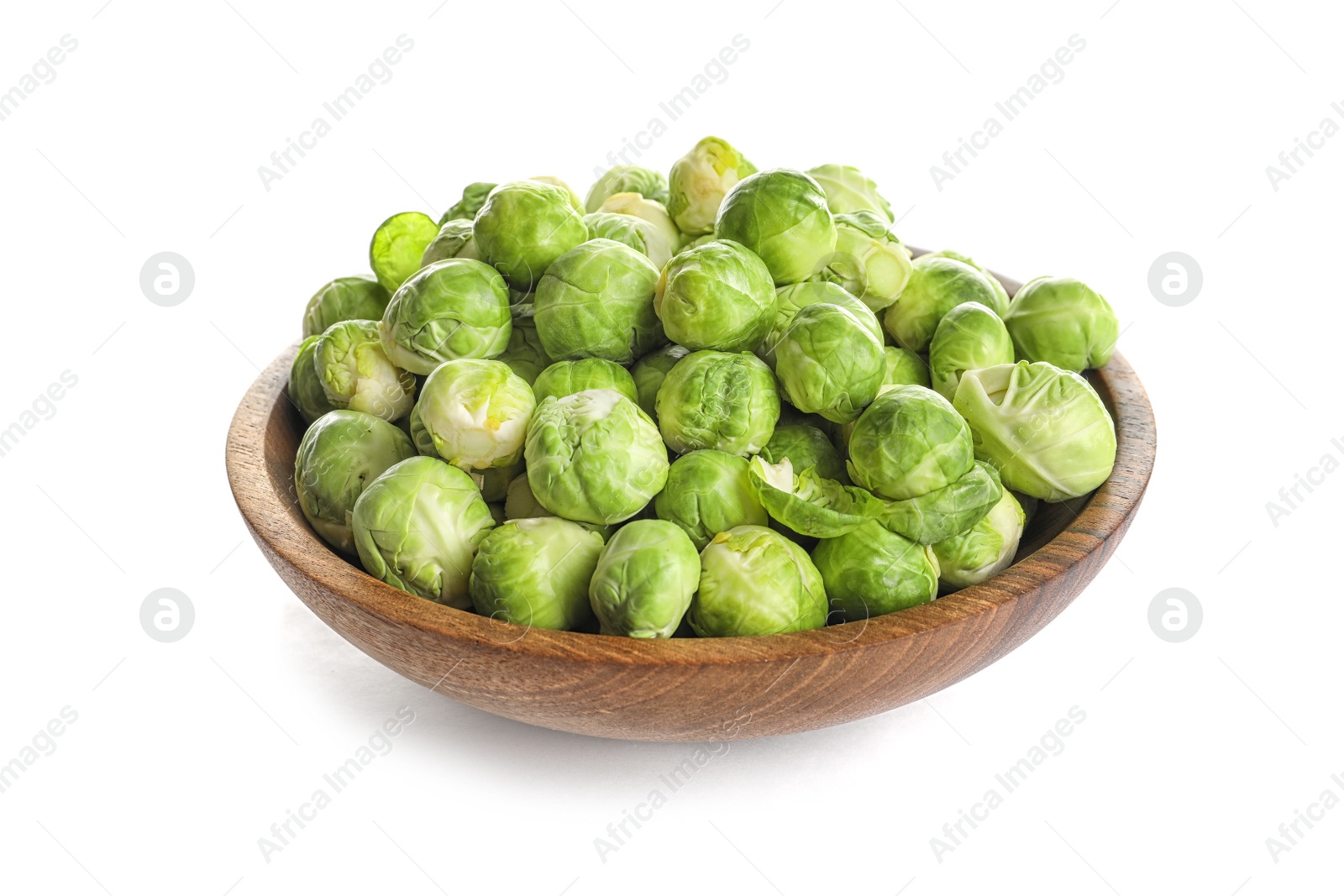 Photo of Bowl of fresh Brussels sprouts isolated on white