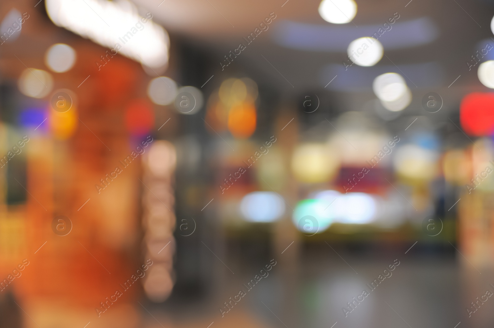 Photo of Blurred view of shopping mall interior. Bokeh effect