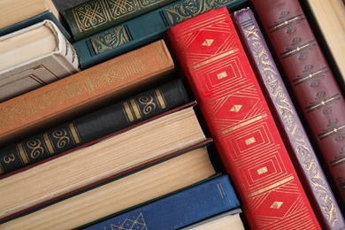 Photo of Stack of hardcover books as background, above view