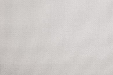 Blank white canvas as background, closeup view