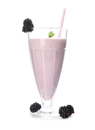 Photo of Tasty fresh milk shake and blackberries on white background