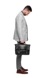 Handsome bearded businessman with briefcase on white background