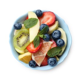 Photo of Tasty fruit salad in bowl isolated on white, top view