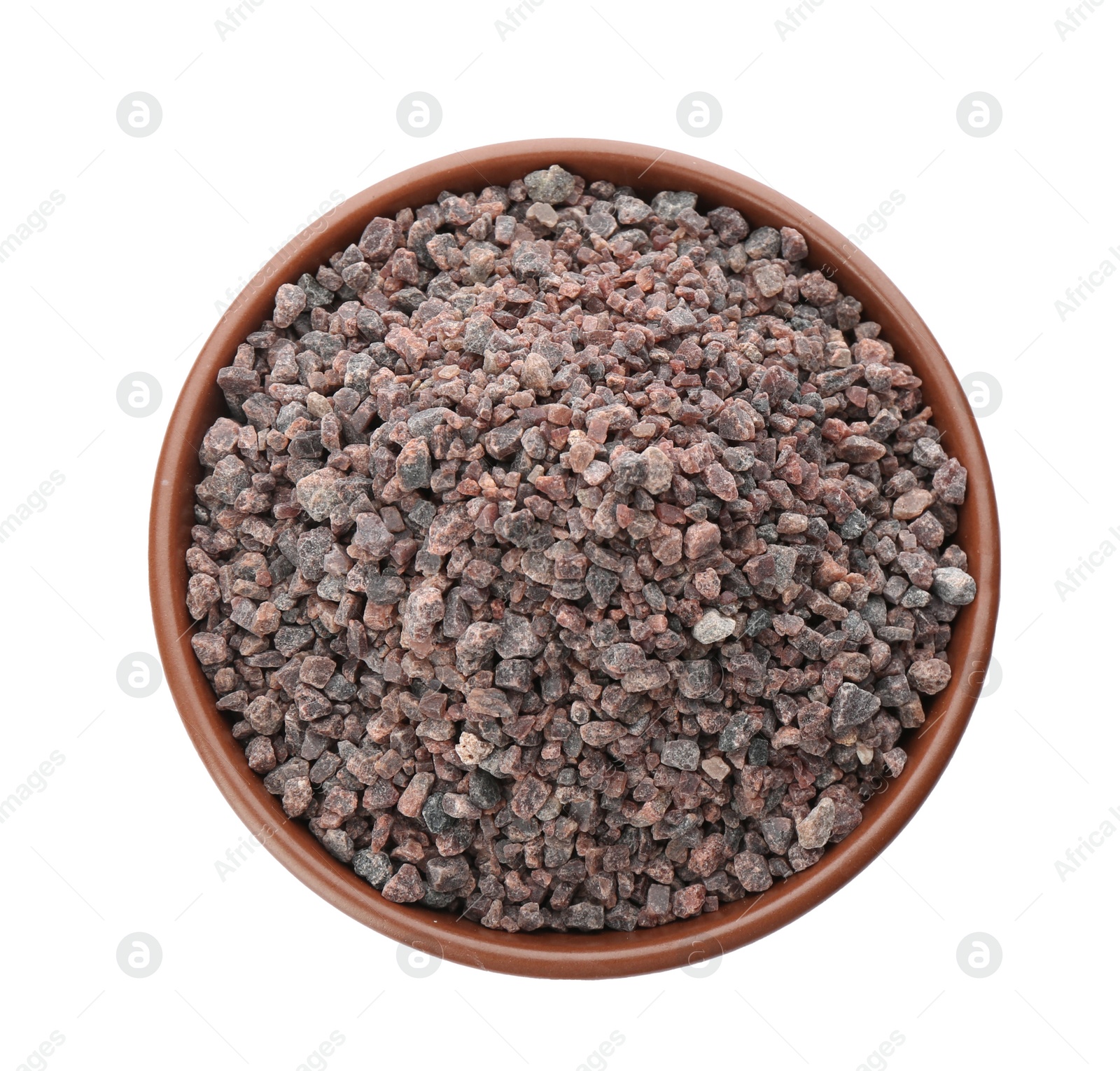 Photo of Bowl of Himalayan black salt isolated on white, top view