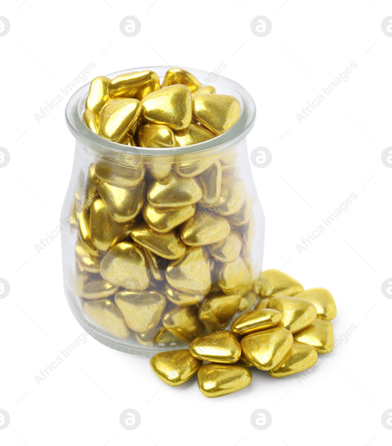 Photo of Glass jar and delicious heart shaped candies on white background