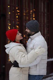 Lovely couple spending time together on city street