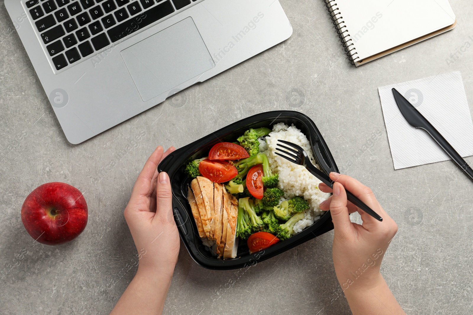 Photo of Office employee having business lunch at workplace, top view