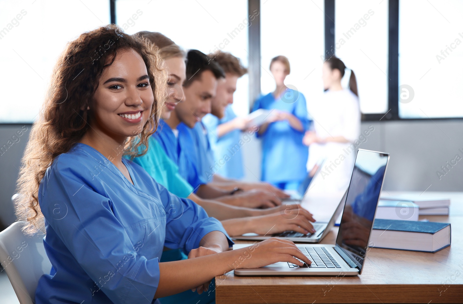 Photo of Smart medical student with her classmates in college