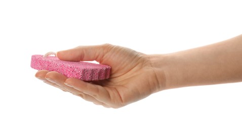 Woman holding pink pumice stone on white background, closeup