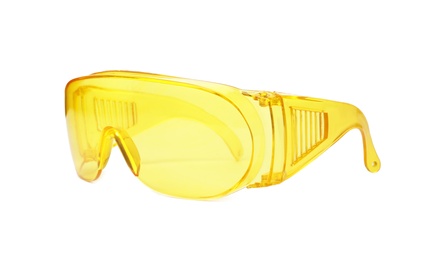 Protective goggles on white background. Construction tool