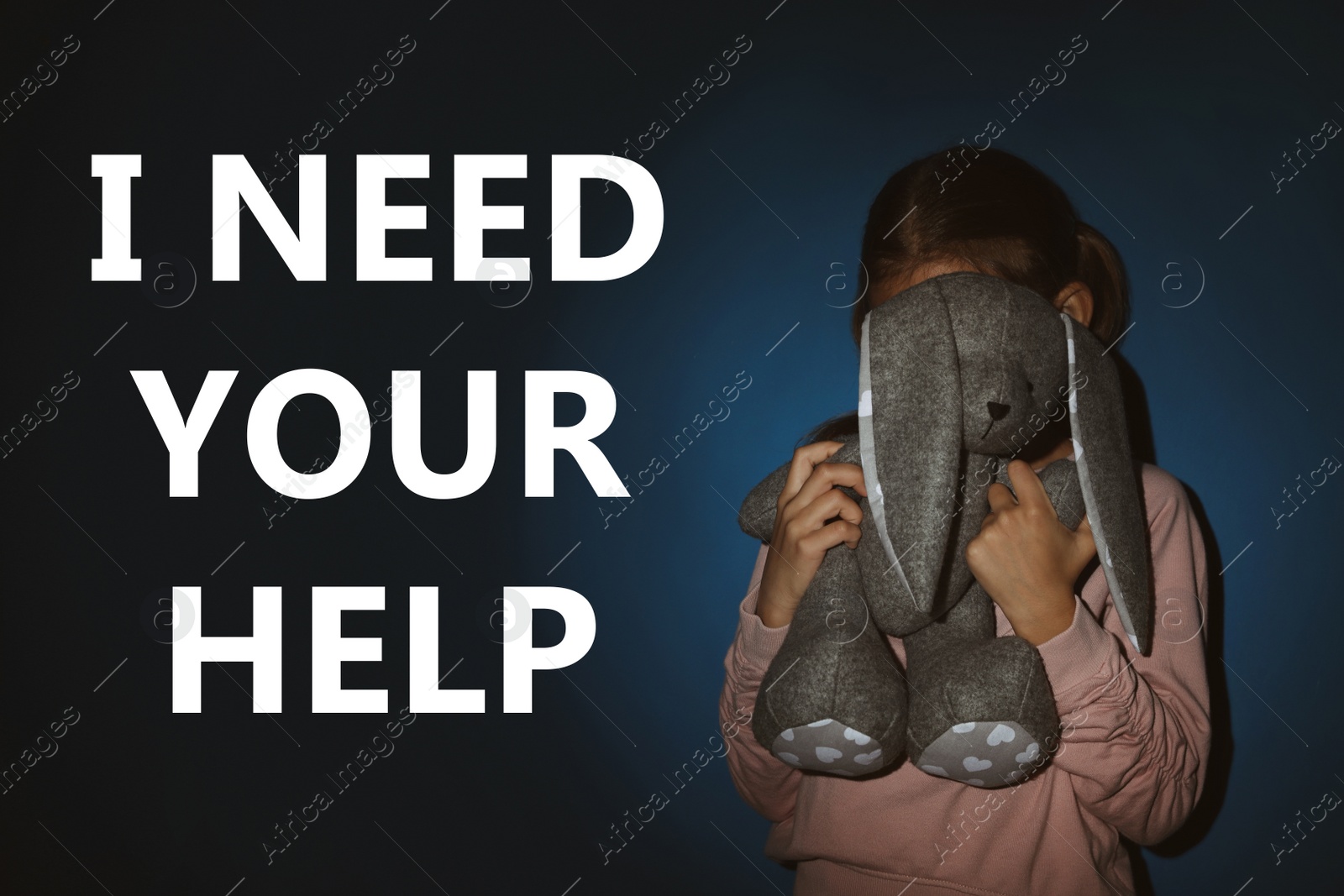 Image of Scared little girl with bunny and text I NEED YOUR HELP on dark background