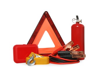 Photo of Set of car safety equipment on white background