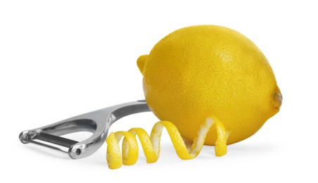 Photo of Peeler, fresh lemon and zest on white background