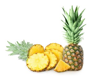 Image of Cut and whole pineapples isolated on white