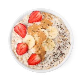 Photo of Tasty boiled oatmeal with strawberries, banana, chia seeds and peanut butter in bowl isolated on white, top view