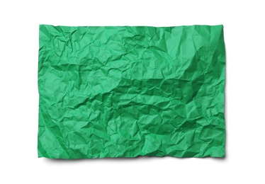 Photo of Color sheet of crumpled paper on white background, top view