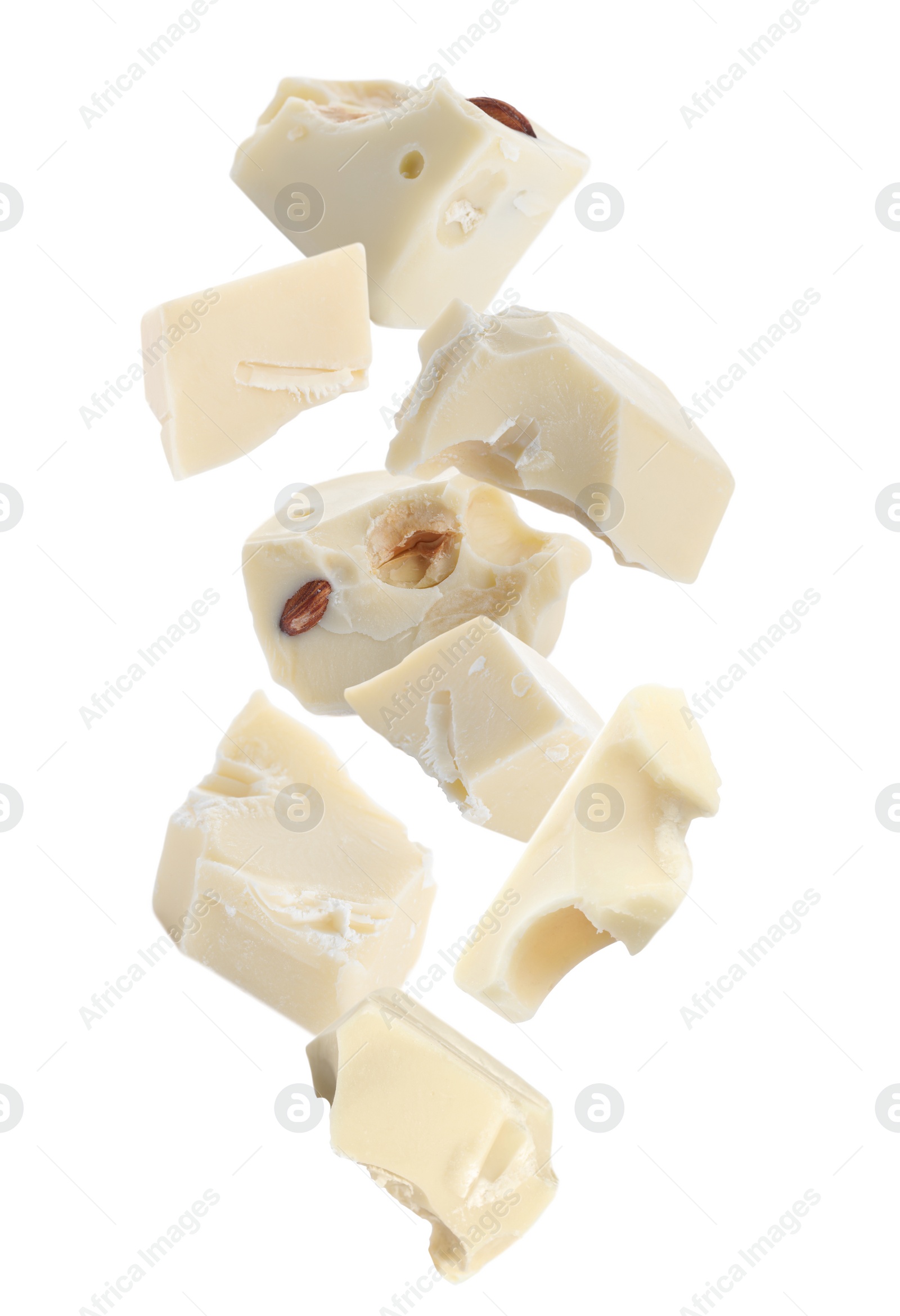 Image of Delicious chocolate chunks falling on white background