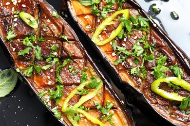 Photo of Frying pan with fried eggplant slices, closeup