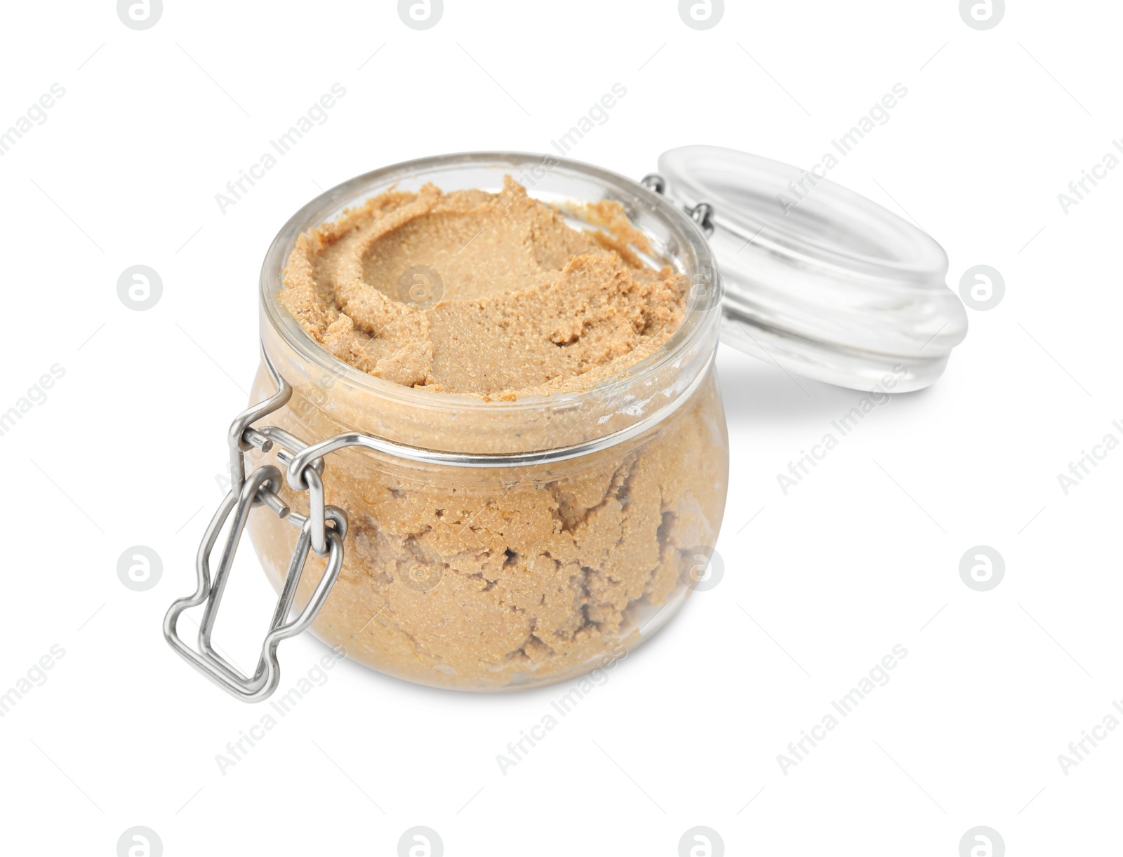 Photo of Delicious meat pate in glass jar isolated on white