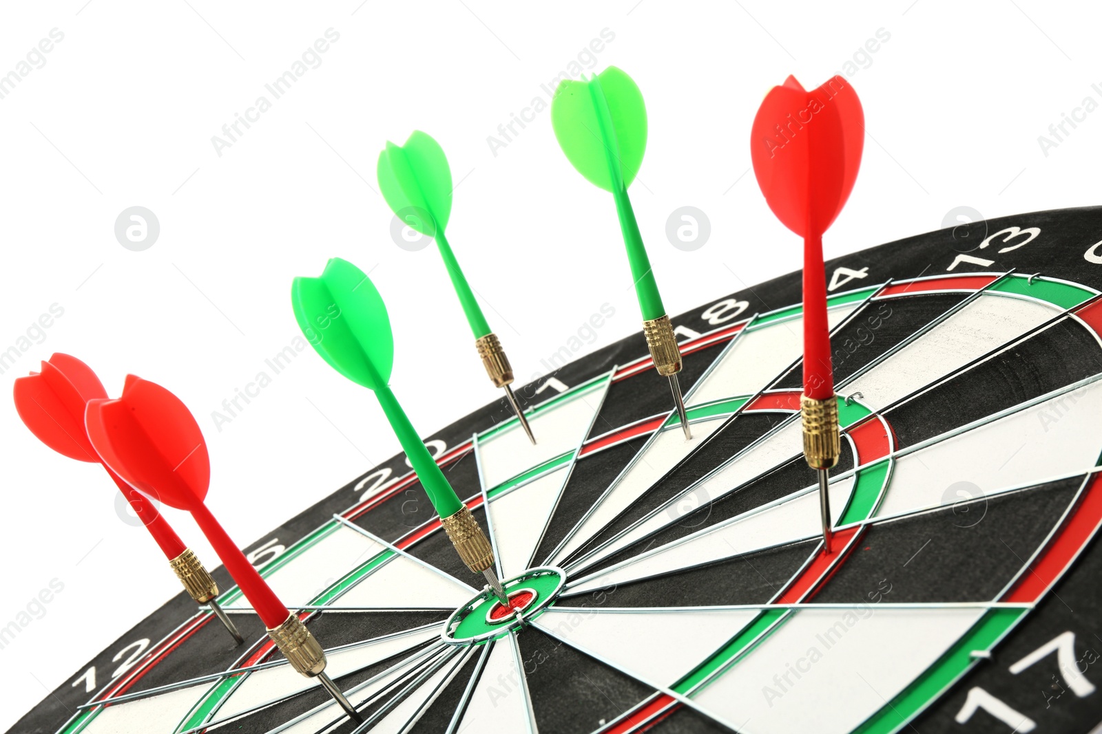 Photo of Dart board with color arrows hitting target, closeup