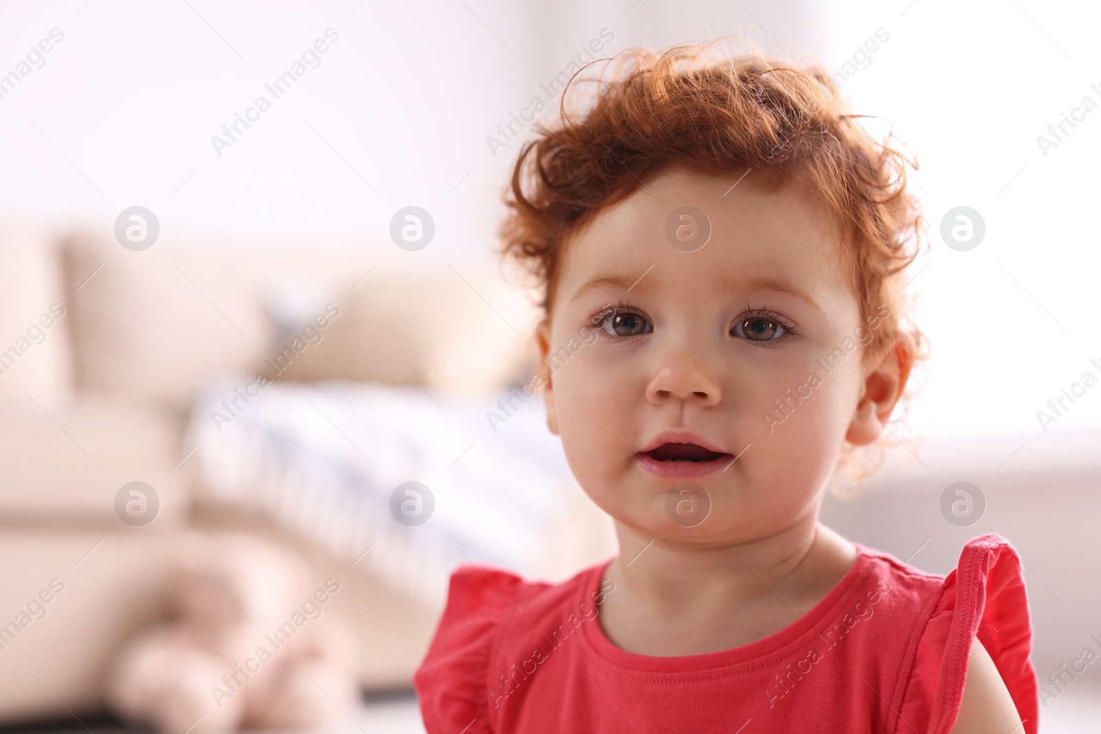 Photo of Portrait of cute little child at home