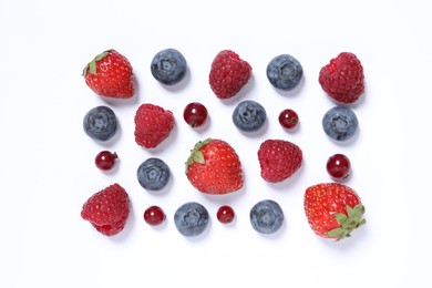 Many different fresh berries on white background, flat lay