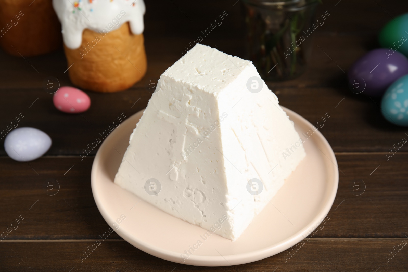 Photo of Traditional cottage cheese Easter paskha on wooden table