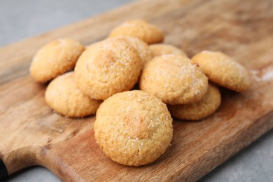 Photo of Tasty fresh sugar cookies on grey table, closeup