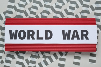 World War concept. Composition with paper card on light background, top view