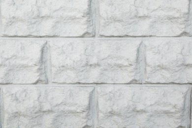 Photo of Texture of grey brick wall as background
