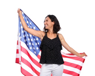 Happy young woman with American flag on white background