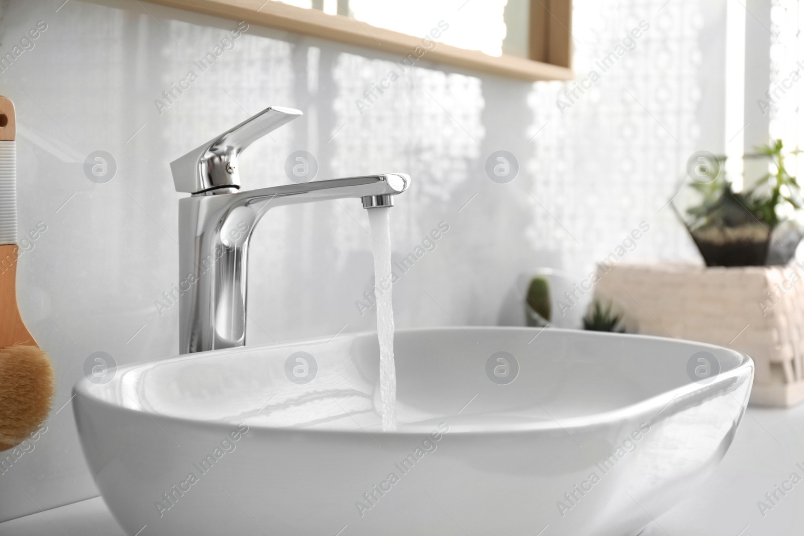 Photo of Stylish white sink in modern bathroom interior