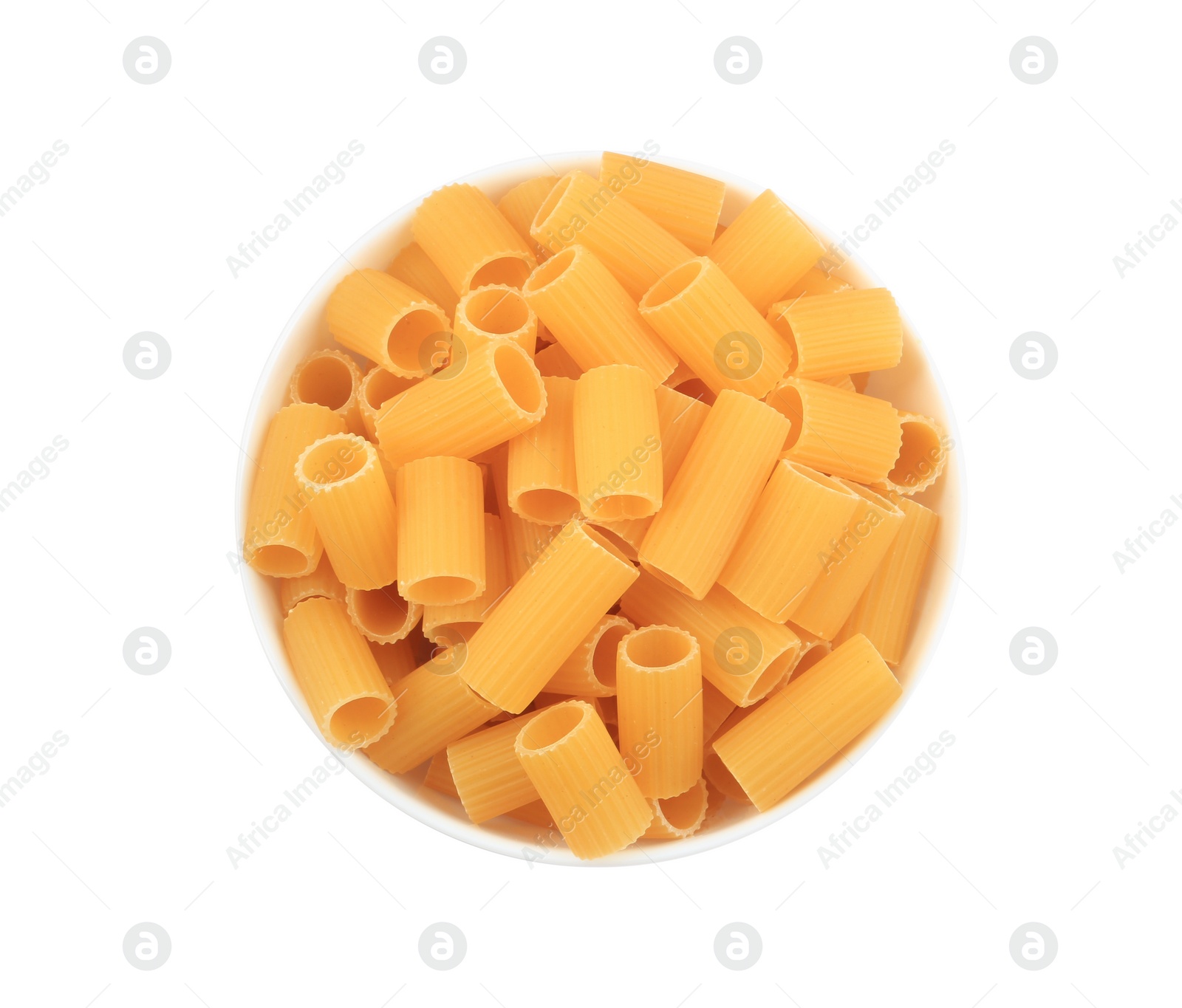 Photo of Raw rigatoni pasta in bowl isolated on white, top view