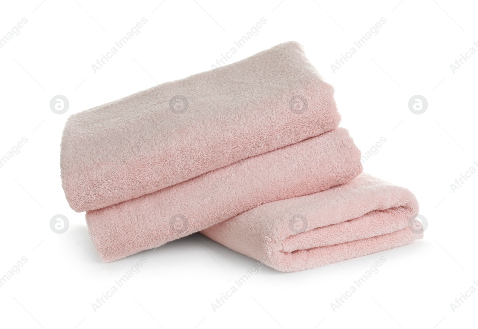 Photo of Stack of clean soft towels on white background