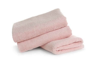 Photo of Stack of clean soft towels on white background