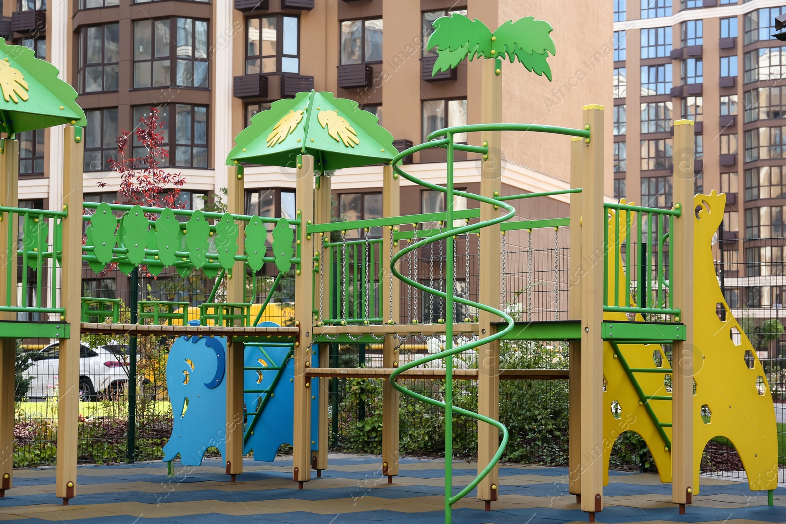 Photo of Colourful outdoor playground for children in residential area